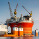 Illustration for article titled Here's The Largest Oil Rig Ever On Top Of The Largest Transport Ship